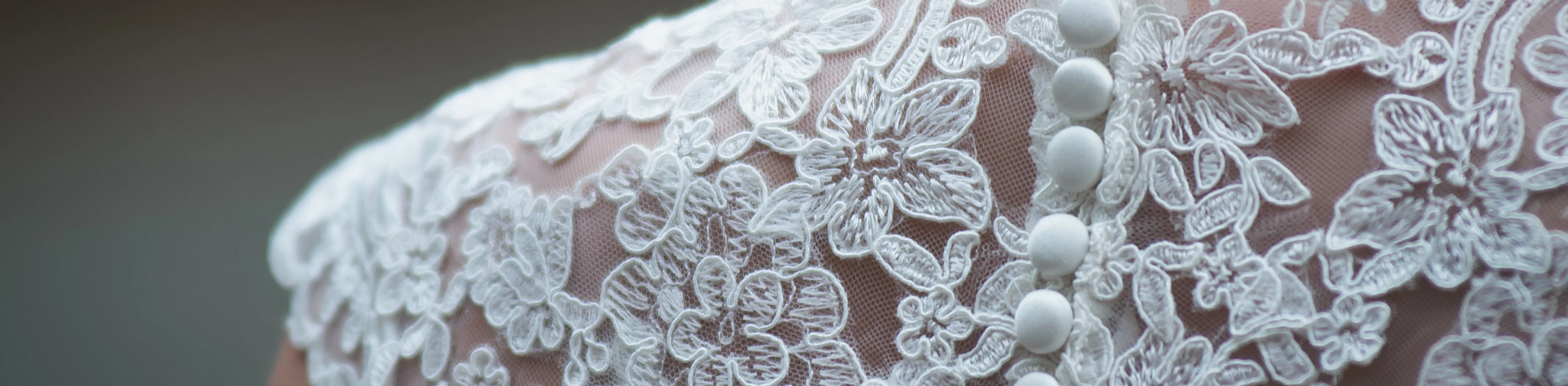 White lace with covered buttons