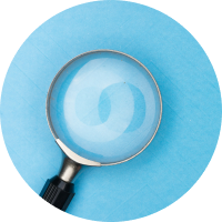 Magnifying glass on a blue background